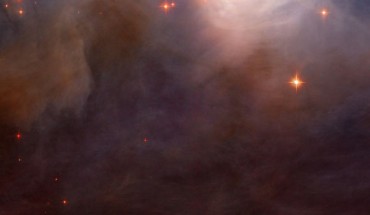 This Hubble image shows a spectacular part of the reflection nebula NGC 7023. The color image was made from separate exposures taken in the visible and near-infrared regions of the spectrum with Hubble’s Near Infrared Camera and Multi-Object Spectrometer. Image credit: NASA / ESA / Hubble.