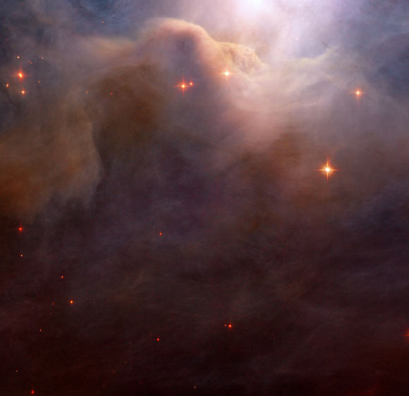This Hubble image shows a spectacular part of the reflection nebula NGC 7023. The color image was made from separate exposures taken in the visible and near-infrared regions of the spectrum with Hubble’s Near Infrared Camera and Multi-Object Spectrometer. Image credit: NASA / ESA / Hubble.
