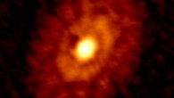 This ALMA image shows young planet-forming dust rings around IRS 63. Image credit: D. Segura-Cox, Max Planck Institute for Extraterrestrial Physics.