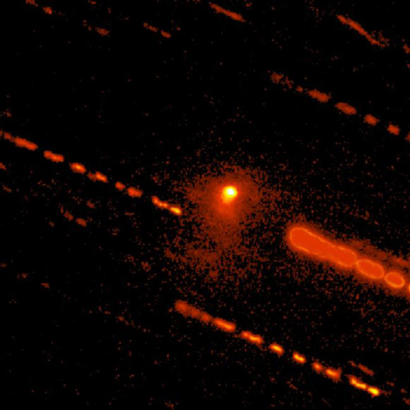 This image, taken by the Large Monolithic Imager on the 4.3-m Lowell Discovery Telescope on October 14, 2020, shows C/2014 OG392 (PANSTARRS) and its extensive coma; the dashed lines are star trails caused by the long exposure. Image credit: Northern Arizona University.