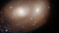 This unusual celestial object, as seen by the NASA/ESA Hubble Space Telescope, is actually a combination of two lenticular galaxies, NGC 2292 and NGC 2293. Image credit: NASA / ESA / Hubble / W. Keel, University of Alabama.