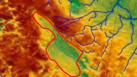 Paxman et al. mapped a huge ancient lake basin (outlined here in red) below the Greenland ice; redder colors signify higher elevations, green ones lower; a stream system incised into the bedrock that once fed the lake is shown in blue. Image credit: Paxman et al., doi: 10.1016/j.epsl.2020.116647.