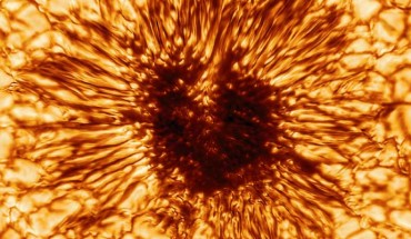 This image of a sunspot was taken on January 28, 2020 by NSF’s Inouye Solar Telescope’s Wave Front Correction context viewer. The image reveals striking details of the sunspot’s structure as seen at the Sun’s surface. The sunspot is sculpted by a convergence of intense magnetic fields and hot gas boiling up from below. This image uses a warm palette of red and orange, but the context viewer took this sunspot image at the wavelength of 530 nm -- in the greenish-yellow part of the visible spectrum. Image credit: NSO / AURA / NSF.