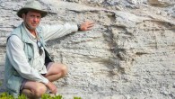 Professor Martin next to the Pleistocene iguana burrow. Image credit: Melissa Hage.