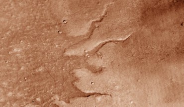 This image shows a suite of fluvial ridges on Mars (at –67.64 °E, 43.37 °S). Image credit: J. Dickson.