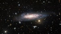 A long-exposure observation lasting 70 min from the Nicholas U. Mayall 4-m Telescope at Kitt Peak National Observatory, a Program of NSF’s NOIRLab, reveals NGC 1003 in glorious detail. This spiral galaxy resides in front of a galaxy cluster and the long exposure time of this deep observation allowed usually overlooked red background cluster galaxies to be captured. Image credit: KPNO / NOIRLab / NSF / AURA / Maria T. Patterson, New Mexico State University / Travis Rector, University of Alaska Anchorage / Mahdi Zamani & Davide de Martin.
