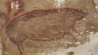 The 45,500-year-old Sulawesi warty pig figure in the rock art panel at Leang Tedongnge cave, Sulawesi, Indonesia. Image credit: Brumm et al., doi: 10.1126/sciadv.abd4648.
