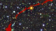 This image shows the giant radio galaxy MGTC J095959.63+024608.6; in the background is the sky as seen in optical light; overlaid in red is the radio light from the giant radio galaxy, as seen by MeerKAT. Image credit: I. Heywood, University of Oxford / Rhodes University / South African Radio Astronomy Observatory / CC BY 4.0.
