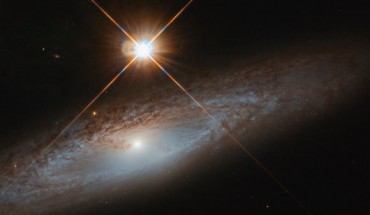 This Hubble image shows UGC 3885, a spiral galaxy some 180 million light-years away in the constellation of Lynx. Image credit: NASA / ESA / Hubble / J. Walsh.