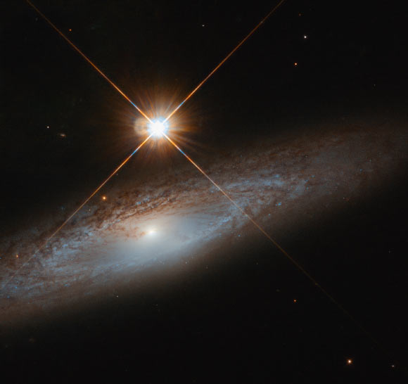 This Hubble image shows UGC 3885, a spiral galaxy some 180 million light-years away in the constellation of Lynx. Image credit: NASA / ESA / Hubble / J. Walsh.