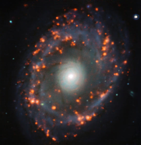 This image, taken with the MUSE instrument on ESO’s Very Large Telescope, shows the spiral galaxy NGC 6902. Image credit: TIMER Survey / ESO.