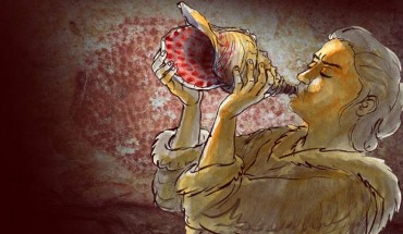 Reconstruction of the seashell horn being played. In the background, a red dotted buffalo decorates the walls of Marsoulas Cave; similar motifs decorate the instrument. Image credit: Gilles Tosello.