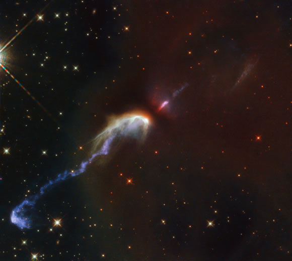 This Hubble image shows two Herbig-Haro objects HH46 and HH47. The color image was made from separate exposures taken in the visible and infrared regions of the spectrum with Hubble’s Wide Field Camera 3 (WFC3). It is based on data obtained through six filters. The color results from assigning different hues to each monochromatic image associated with an individual filter. Image credit: NASA / ESA / Hubble / B. Nisini.