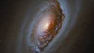 This Hubble image shows Messier 64, a spiral galaxy located some 17 million light-years away in the constellation of Coma Berenices. This color composite was made from separate exposures taken in the visible, near-infrared and ultraviolet regions of the spectrum with Hubble’s Wide Field Camera 3 (WFC3). Five filters were used to sample various wavelengths. The color results from assigning different hues to each monochromatic image associated with an individual filter. Image credit: NASA / ESA / Hubble / J. Lee / PHANGS-HST Team / Judy Schmidt, www.geckzilla.com.