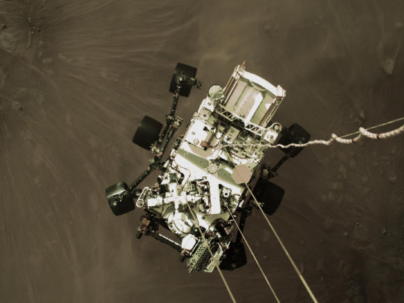 This high-resolution still image is part of a video taken by several cameras as NASA’s Perseverance rover touched down on Mars on February 18, 2021. Image credit: NASA / JPL-Caltech.