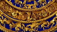 Gold Scythian pectoral from a royal kurgan in Towsta Mohila, Pokrov, dated to the 2nd half of the 4th century BCE. The central lower tier shows three horses, each being torn apart by two griffins. Image credit: D. Kolosov.