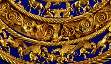 Gold Scythian pectoral from a royal kurgan in Towsta Mohila, Pokrov, dated to the 2nd half of the 4th century BCE. The central lower tier shows three horses, each being torn apart by two griffins. Image credit: D. Kolosov.