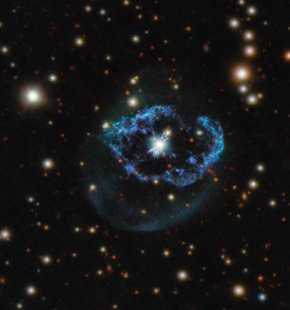 This composite image by Hubble and Pan-STARRS1 telescopes shows Abell 78, a planetary nebula located 5,000 light-years away in the constellation of Cygnus. Image credit: NASA / ESA / Hubble / M. Guerrero / Judy Schmidt, www.geckzilla.com.