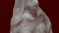 The 2,500-years-old figurine depicts a bare-breasted woman wearing a scarf. Image credit: Israel Antiquities Authority.