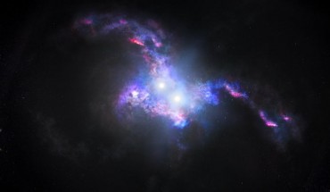 This artist’s conception shows the brilliant light of two quasars residing in the cores of two galaxies that are in the chaotic process of merging. Image credit: NASA / ESA / J. Olmsted, STScI.