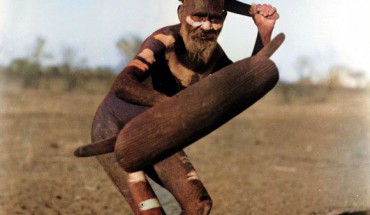 Australian Luritja man demonstrating method of attack with boomerang under cover of shield, c. 1920. Image credit: National Museum of Australia.