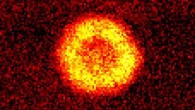 Zhang et al. demonstrate the long-sought transition between atomic and molecular condensates, the bosonic analogue of the crossover from a Bose-Einstein condensate to a Bardeen-Cooper-Schrieffer superfluid in a Fermi gas. Image credit: Zhang et al., doi: 10.1038/s41586-021-03443-0.