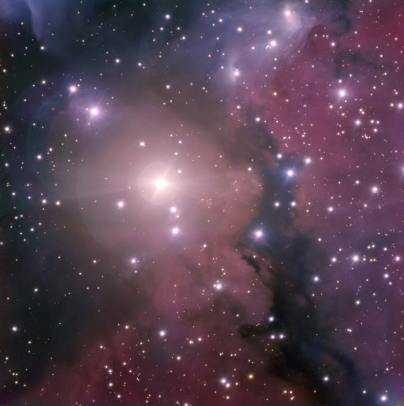 This image, taken with ESO’s Very Large Telescope, shows the HII region DG121, which is also known as RCW 7, GAL 232.62+01.00, and IRAS 07299-1651. The brightest star in DG121, seen near the center in the picture, is HD 60068. Image credit: ESO.
