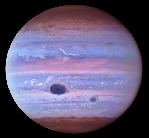 This ultraviolet image of Jupiter was created from data captured on January 11, 2017 using Hubble’s Wide Field Camera 3. The Great Red Spot and Red Spot Jr. absorb ultraviolet radiation from the Sun and therefore appear dark in this view. Image credit: NASA / ESA / NOIRLab / NSF / AURA / Wong et al. / de Pater et al. / M. Zamani.