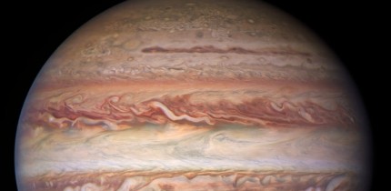 This visible-light image of Jupiter was created from data captured on January 11, 2017 using Hubble’s Wide Field Camera 3. Near the top, a long brown feature called a ‘brown barge’ extends 72,000 km (nearly 45,000 miles) in the east-west direction. The Great Red Spot stands out prominently in the lower left, while the smaller feature nicknamed Red Spot Jr. (known to Jovian scientists as Oval BA) appears to its lower right. Image credit: NASA / ESA / NOIRLab / NSF / AURA / Wong et al. / de Pater et al. / M. Zamani.