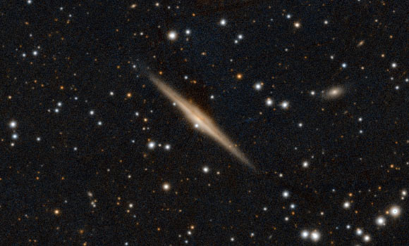 This image shows the Milky Way-like galaxy UGC 10738. Image credit: Centre de Données astronomiques de Strasbourg / SIMBAD / PanSTARRS.