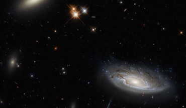 This Hubble image shows two galaxies, 2MASX J03193743+4137580 (left) and UGC 2665 (right), in the Perseus cluster. Image credit: NASA / ESA / Hubble / W. Harris / L. Shatz.
