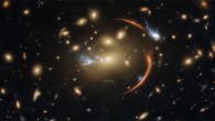 This Hubble image shows the galaxy cluster MACS J0138.0-2155, which is so massive that its gravity bent and magnified light streaming not only from an extremely distant background galaxy but also from a supernova event in this galaxy. The color image was made using observations from eight different filters spread across Hubble’s Advanced Camera for Surveys (ACS) and Wide Field Camera 3 (WFC3). The color results from assigning different hues to each monochromatic image associated with an individual filter. Image credit: NASA / ESA / Hubble / A. Newman / M. Akhshik / K. Whitaker.
