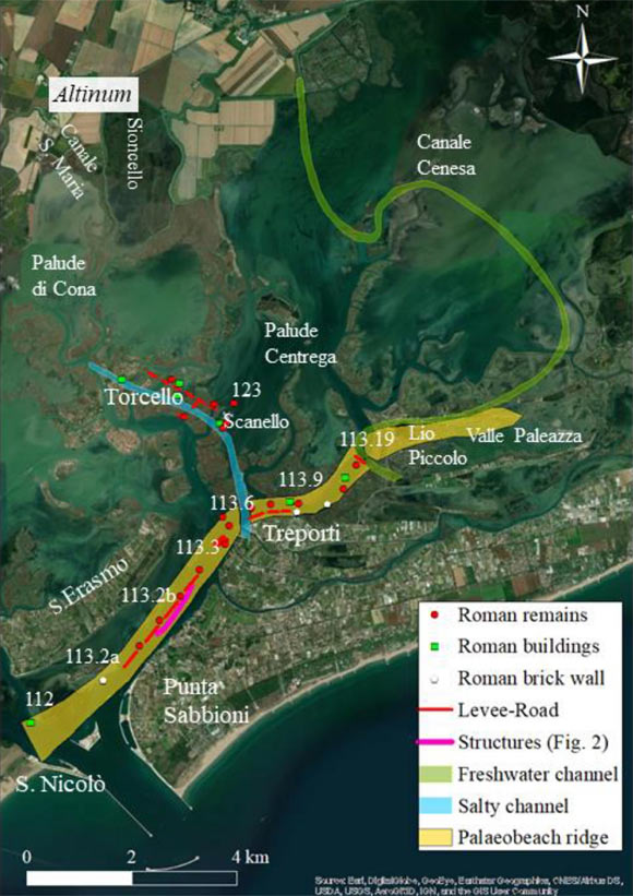 The position of the paleobeach ridge in the Treporti Channel in Roman times (in yellow in transparency over the current satellite data) and the alignment of Roman stone remains and levee road (red dots and lines), buildings (green squares) and brick walls (white pentagons); the pink solid line indicates the position of the structures reconstructed by Madricardo et al. Image credit: Madricardo et al., doi: 10.1038/s41598-021-92939-w.