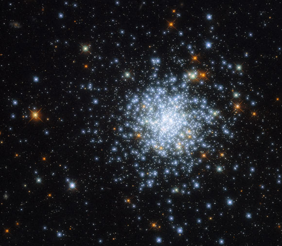 This Hubble image shows NGC 2164, a young open cluster located some 160,000 light-years away in the constellation of Dorado. The color image is made up of observations from Hubble’s Wide Field Camera 3 (WFC3) in the ultraviolet, near-infrared, and optical parts of the spectrum. It is based on data obtained through four filters. The color results from assigning different hues to each monochromatic image associated with an individual filter. Image credit: NASA / ESA / Hubble / J. Kalirai / Milone.