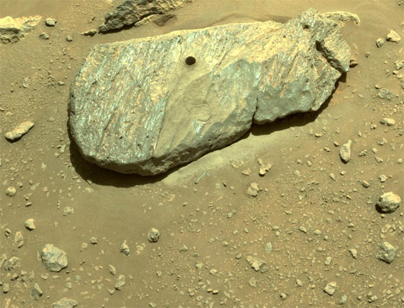 The drill hole from Perseverance’s second sample-collection attempt can be seen in this composite of two images taken on September 1, 2021 by one of the rover’s navigation cameras. Image credit: NASA / JPL-Caltech.