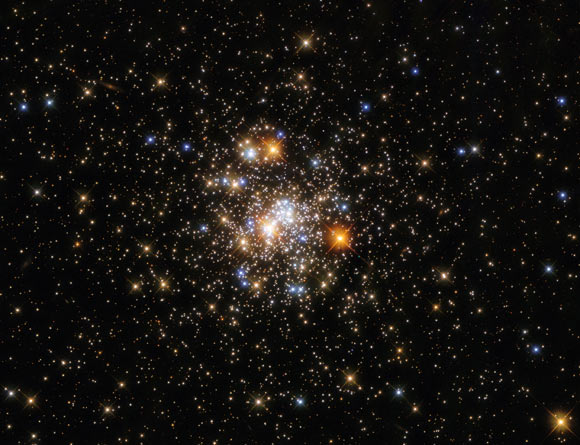 This Hubble image shows NGC 6717, a globular cluster located over 23,000 light-years away in the constellation of Sagittarius. The image is made up of observations from Hubble’s Wide Field Camera 3 (WFC3) and Advanced Camera for Surveys (ACS) in the ultraviolet, near-infrared, and optical parts of the spectrum. It is based on data obtained through five filters. The color results from assigning different hues to each monochromatic image associated with an individual filter. Image credit: NASA / ESA / Hubble / A. Sarajedini.
