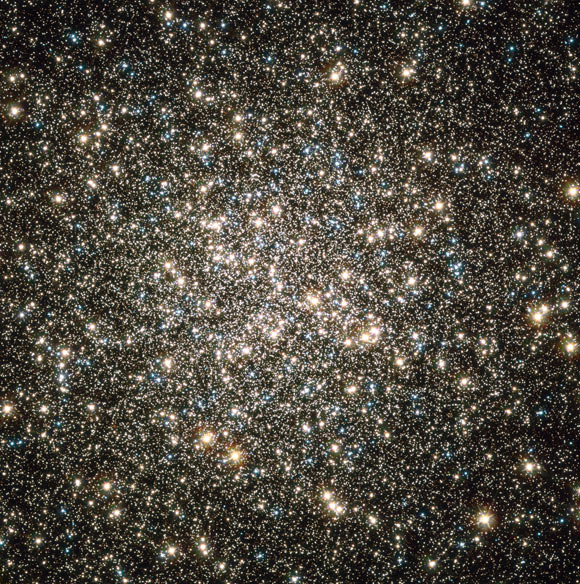This Hubble image shows Messier 13, a globular cluster located 25,000 light-years away in the constellation of Hercules. Image credit: NASA / ESA / Hubble Heritage Team / STScI / AURA / C. Bailyn, Yale University / W. Lewin, MIT / A. Sarajedini, University of Florida / W. van Altena, Yale University.