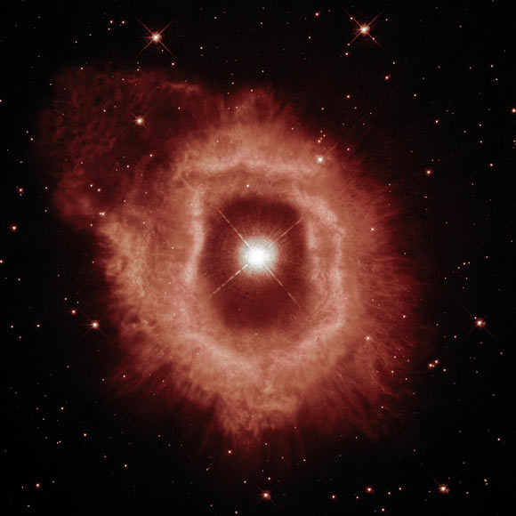 This Hubble image shows a giant star called AG Carinae. The color image was made from separate exposures taken in the visible region of the spectrum with Hubble’s Wide Field Planetary Camera 2 (WFPC2) and Wide Field Camera 3 (WFC3). It is based on data obtained through two filters. The color results from assigning different hues to each monochromatic image associated with an individual filter. Image credit: NASA / ESA / Hubble / A. Nota / C. Britt.