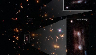 This Hubble snapshot shows three magnified images of a distant galaxy embedded in a cluster of galaxies called SDSS J223010.47-081017.8. Image credit: NASA / ESA / Hubble / Richard E. Griffiths, University of Hawaii / Jenny Wagner, University of Heidelberg / Joseph DePasquale, STScI.