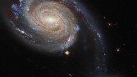 This composite image shows two interacting galaxies NGC 7752 and NGC 7753, collectively known as Arp 86. The image is composed of infrared, optical and ultraviolet observations from Hubble’s Advanced Camera for Surveys (ACS), the Dark Energy Camera (DECam) on the Victor M. Blanco 4-m Telescope, and the Sloan Digital Sky Survey (SDSS). Nine filters were used to sample various wavelengths. The color results from assigning different hues to each monochromatic image associated with an individual filter. Image credit: NASA / ESA / Hubble / Dark Energy Survey / J. Dalcanton.