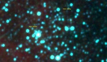 This WISE multicolor image shows NGC 1605, a binary open cluster located 8,480 light-years away in the constellation of Perseus. It was first discovered on December 11, 1786 by the German-born British astronomer William Herschel. Image credit: NASA / WISE / Camargo, arXiv: 2109.14664.