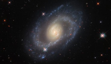 This Hubble image shows Markarian 1337, a barred spiral galaxy 119.5 million light-years away in the constellation of Virgo. Image credit: NASA / ESA / Hubble / Riess et al.