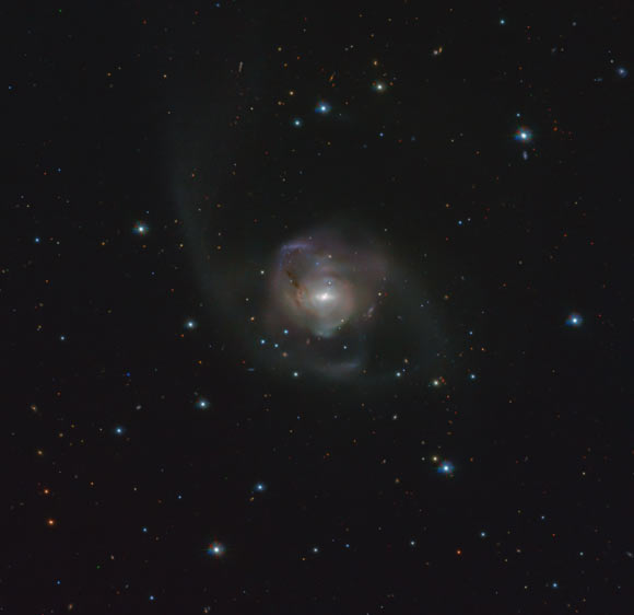 This image, taken with ESO’s VLT Survey Telescope, shows the peculiar galaxy NGC 7727. Image credit: ESO / VST-ATLAS Team / Durham University / CASU / WFAU.