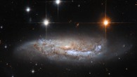 This Hubble image shows NGC 3568, a barred spiral galaxy some 57 million light-years away in the constellation of Centaurus. The color image is made up of observations from Hubble’s Wide Field Camera 3 (WFC3) and Advanced Camera for Surveys (ACS) instruments in the ultraviolet, near-infrared, and optical parts of the spectrum. It is based on data obtained through three filters. The color results from assigning different hues to each monochromatic image associated with an individual filter. Image credit: NASA / ESA / Hubble / M. Sun.