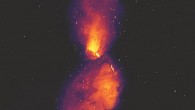 This MWA image shows Centaurus A at radio wavelengths, revealing vast lobes of plasma that reach far beyond the visible galaxy, which occupies only a small patch at the center of the image. The dots in the background are not stars, but radio galaxies much like Centaurus A, at far greater distances. Image credit: Ben McKinley, ICRAR & Curtin University / Connor Matherne, Louisiana State University.