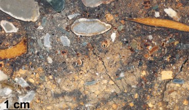 Surface of a section of undisturbed block of sediment from Denisova Cave. Image credit: Mike Morley / Flinders University.