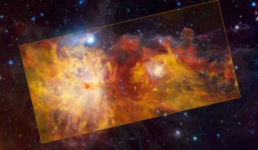 The Flame Nebula is the large feature on the left half of the central, yellow rectangle. The smaller feature on the right is the reflection nebula NGC 2023. To the top right of NGC 2023, the iconic Horsehead Nebula seems to emerge heroically from the ‘flames.’ The three objects are part of the Orion cloud, a giant gas structure located between 1,300 and 1,600 light-years away. The different colors indicate the velocity of the gas. The Flame Nebula and its surroundings are moving away from us, with the red clouds in the background receding faster than the yellow ones in the foreground. Image credit: ESO / Thomas Stanke / J. Emerson / VISTA / Cambridge Astronomical Survey Unit.