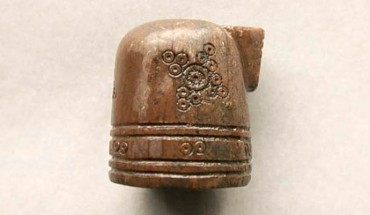 The 800-year-old Arabic-inspired chess piece is richly decorated with circles. Image credit: Lars Haugesten, Norwegian Institute for Cultural Heritage Research.