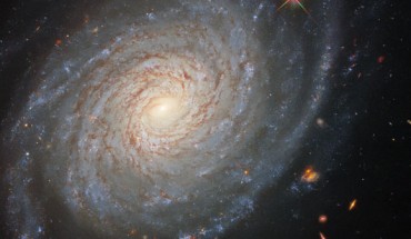 This Hubble image shows NGC 976, a spiral galaxy located 150 million light-years away in the constellation of Aries. Image credit: NASA / ESA / Hubble / D. Jones / Riess et al.