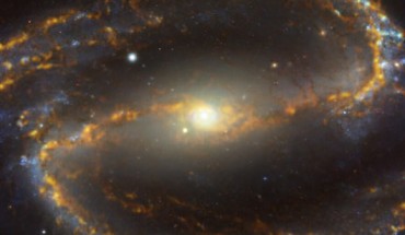 This image shows NGC 1300, a barred spiral galaxy some 61 million light-years away in the constellation of Eridanus. Image credit: ESO / ALMA / NAOJ / NRAO / PHANGS.